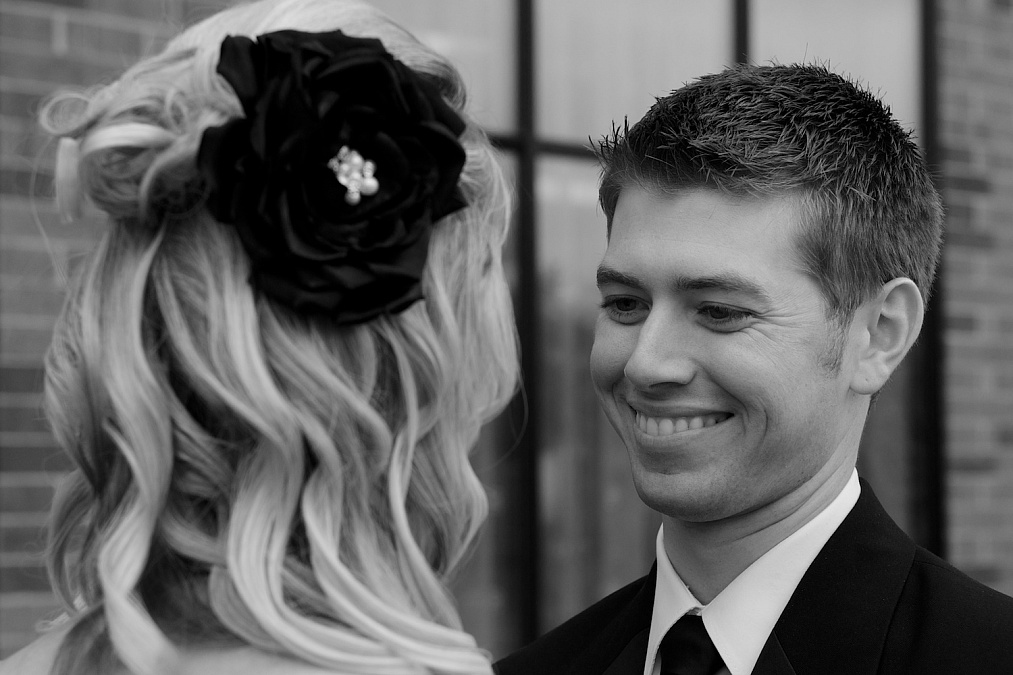 The couple shares their first look of each other on their wedding day at the Marriott in Coralvile.