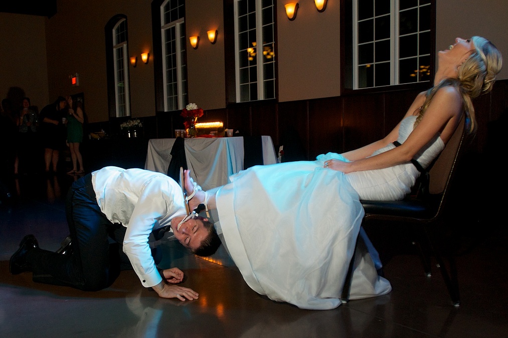 Retreiving the garter for the toss.