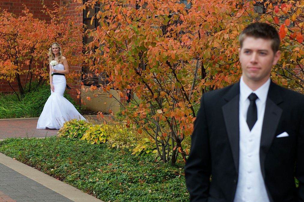 The couple shares their first look of each other on their wedding day at the Marriott in Coralvile.