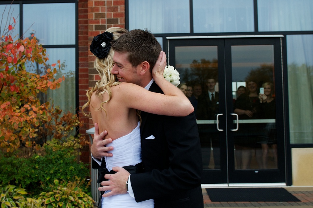 The couple shares their first look of each other on their wedding day at the Marriott in Coralvile.